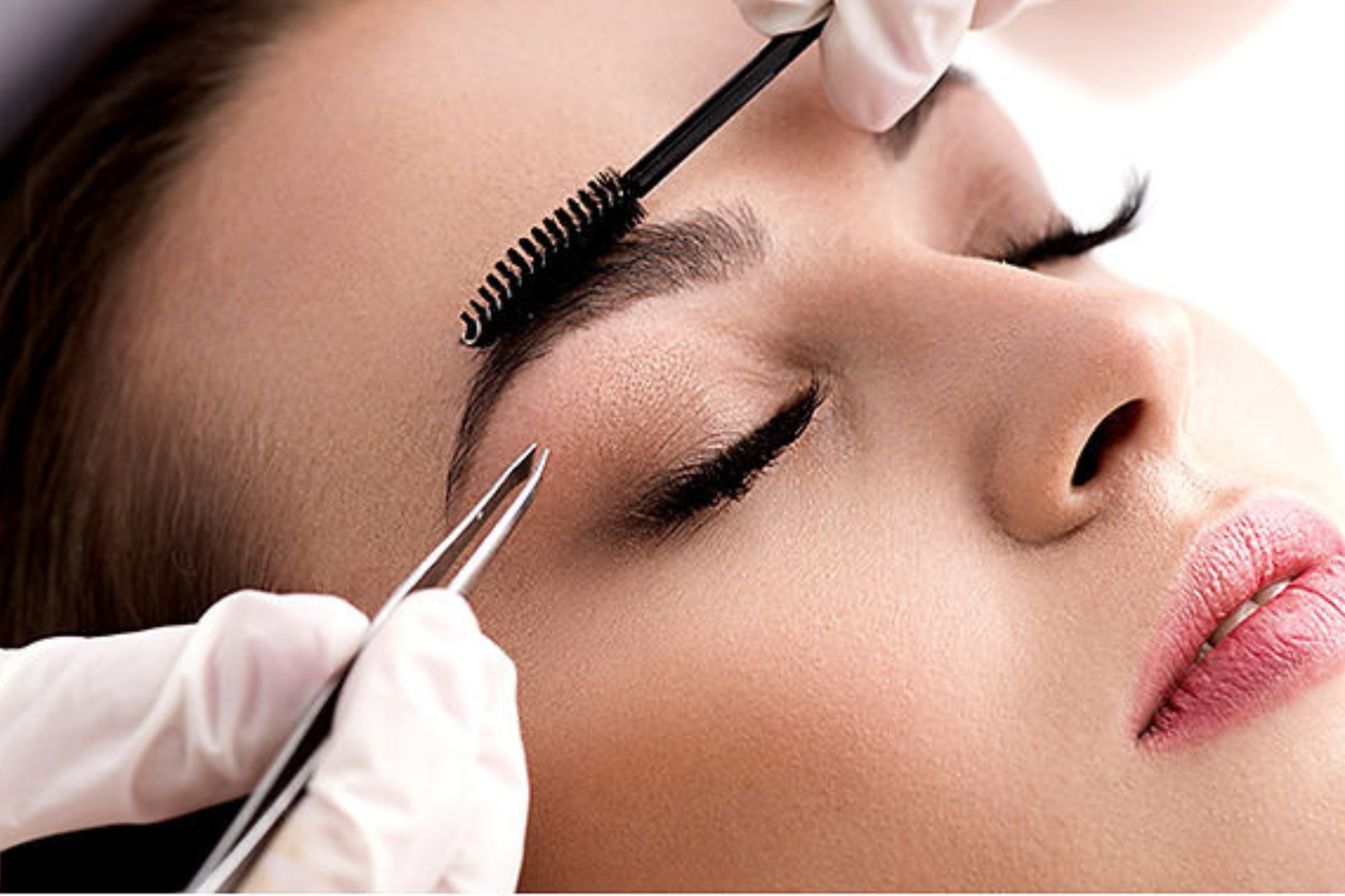 Eyebrow shaping with tweezers